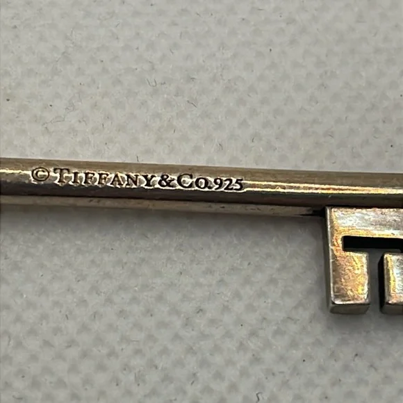 Tiffany & Co Fleur De Lis Key Pendant Charm 925 Sterling Silver